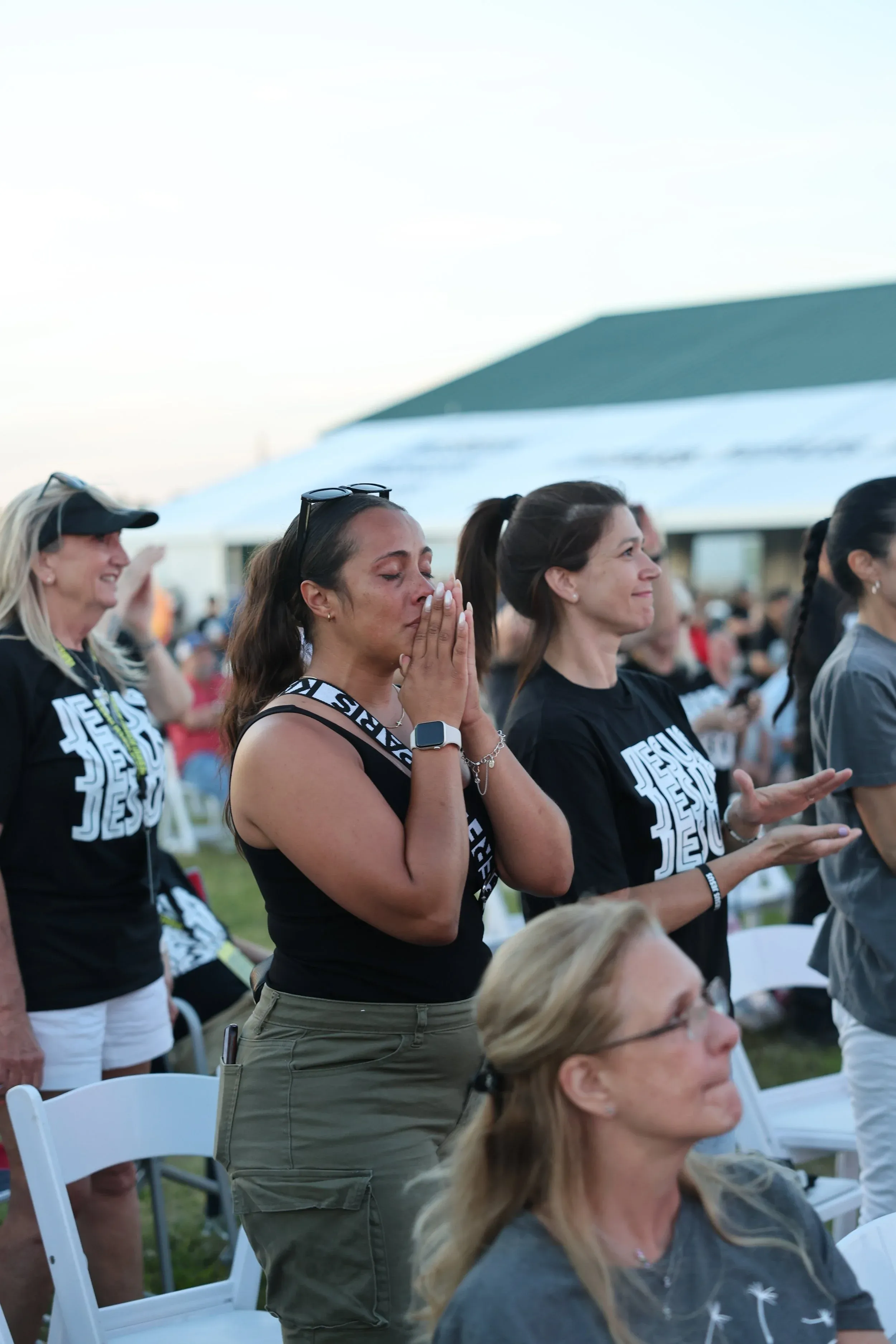 Women moved during worship at The Field